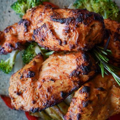 Close up of tandoori chicken plate.