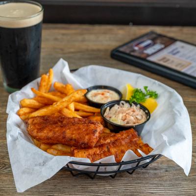 Beer-battered Atlantic cod served with coleslaw, tartar sauce, fries and dark beer.