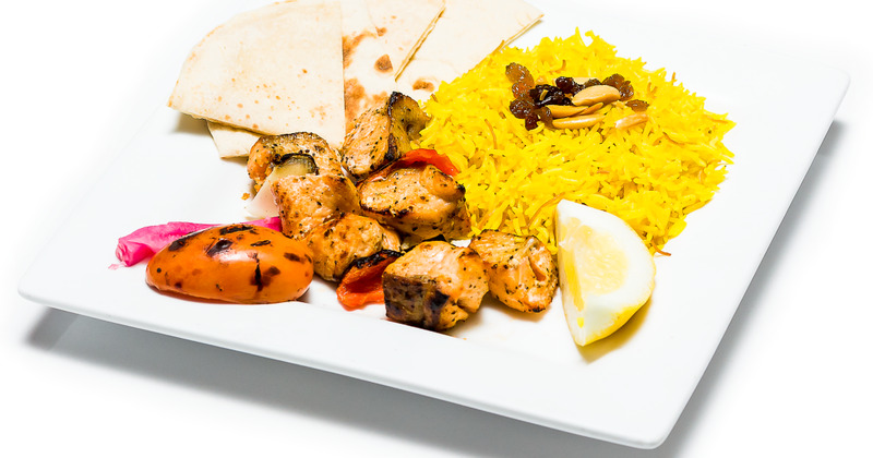 Grilled meat, yellow rice and snacks