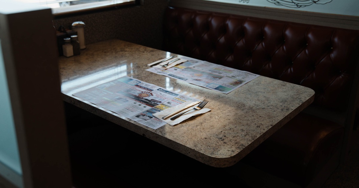 Interior, leather booth ready for guests