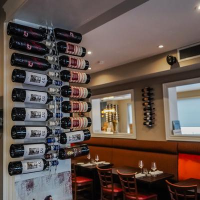 Bottles on the interior restaurant wall.