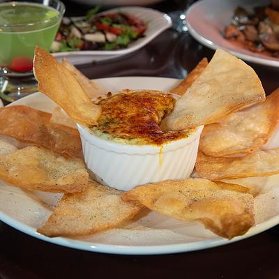 Spinach dip with chips.