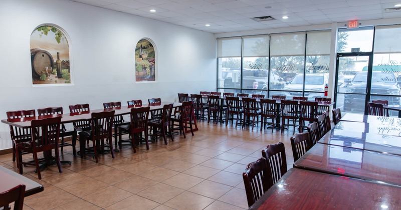 Interior, dining area with long tables and chairs