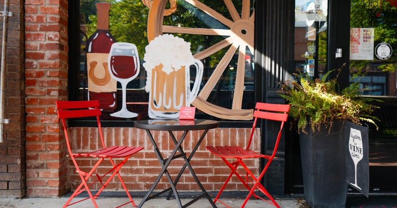Exterior, red chairs and black table