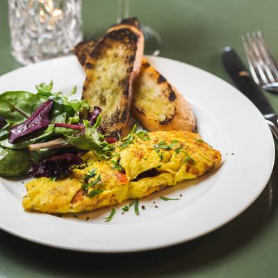 Sicilian Omelet, with salad and toast.