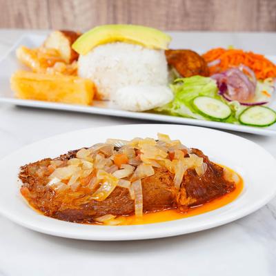 Meat dish with sides.