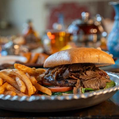 Basil’s Ultimate Burger with fries.