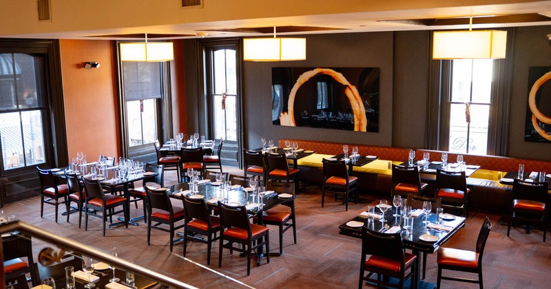 Inside, seating area with tables and chairs