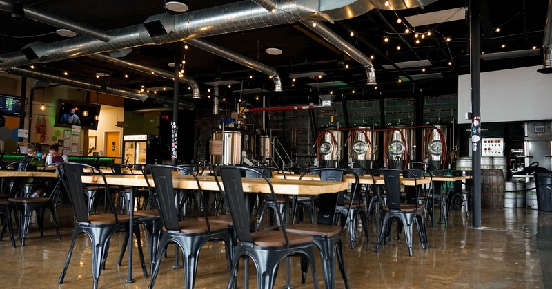 Interior, seating area with a view of the distillery