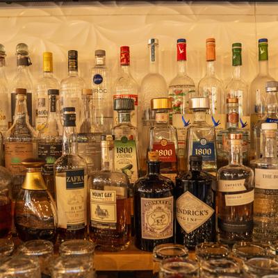 Assorted liquor bottles at the bar.