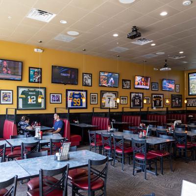 The restaurant's interior, tables and chairs.