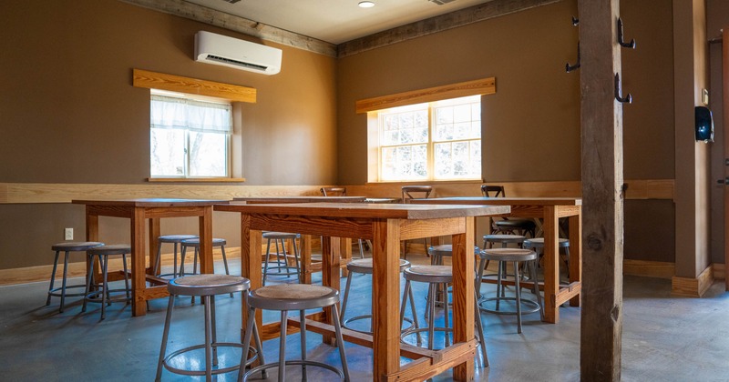 Interior, tables and chairs in seating area