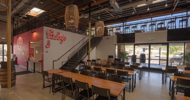 Interior, view of seating area downstairs and upstairs