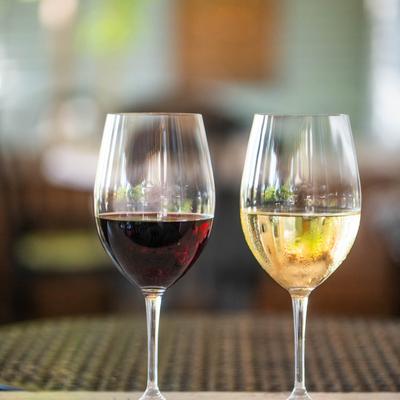 Glasses with wine on display.