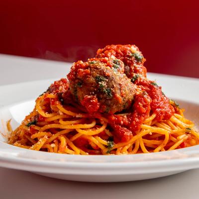 Spaghetti with meatballs in tomato sauce.