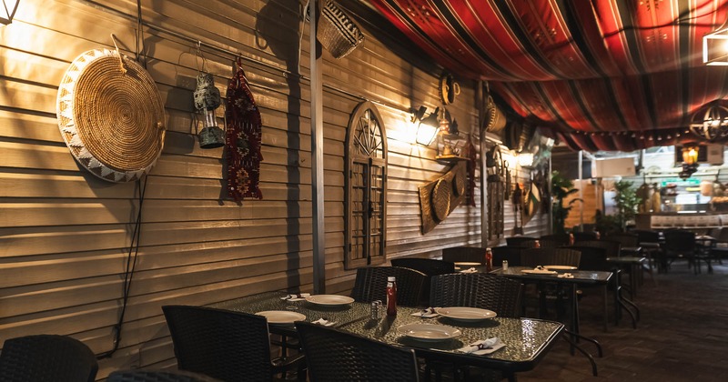 Interior, tables and chairs ready for guests