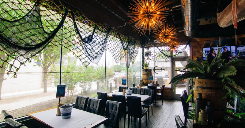 Interior, tables and chairs ready for guests