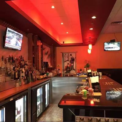Bar area with liquor bottles.
