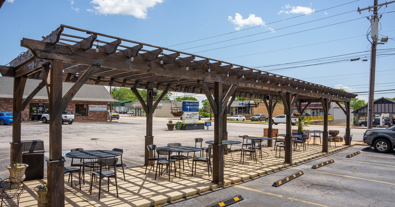 Outdoor, seating area with tables and chairs