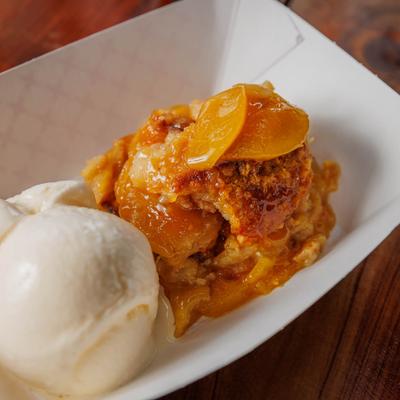 Peach Cobbler, with vanilla ice cream.