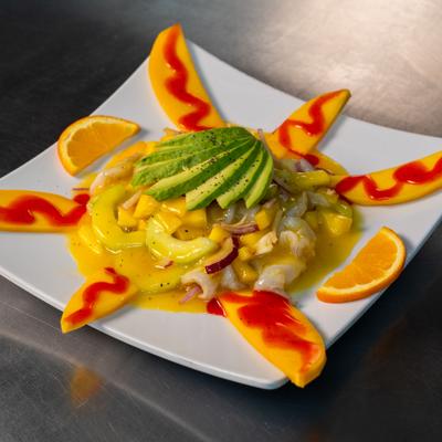 Mango aguachile with shrimp, avocado, and mango sauce.