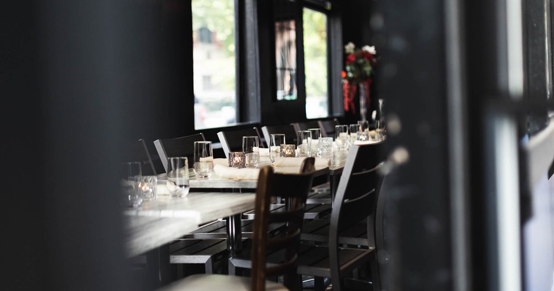 Interior, tables decorated with candles in a row