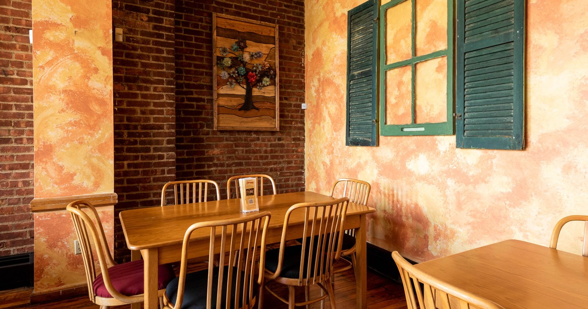 Interior, chairs and tables, painting on the wall