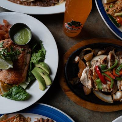 Various food and a cocktail drink.