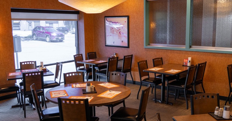 Interior seating area with chairs and tables
