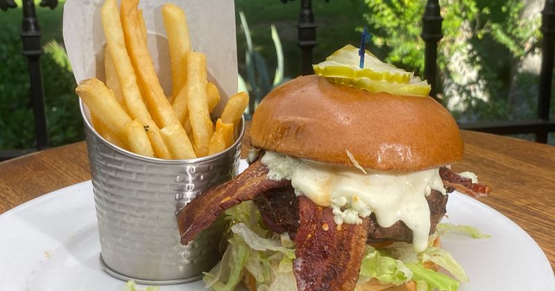 Gorgonzola blue cheese burger with bacon, and fries