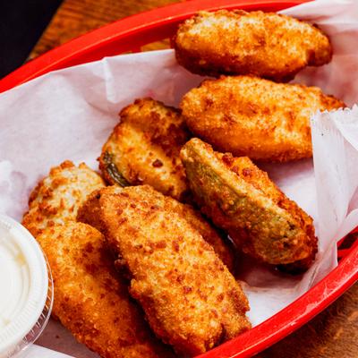 Pepper Jack Sticks served with a side of dipping sauce.