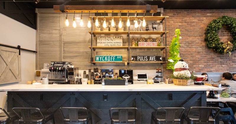 Bar area, bar stools neatly lined up