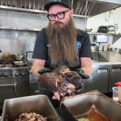 The chef preparing food.