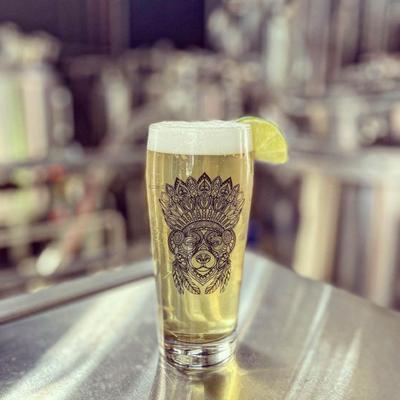 A glass of light beer.