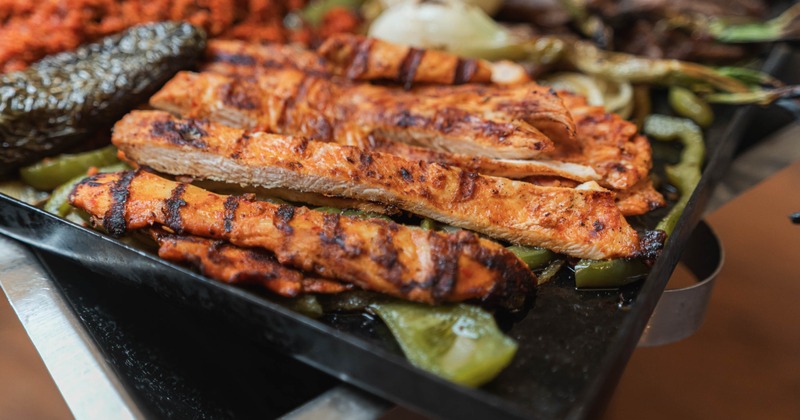 A sizzling platter of fajitas