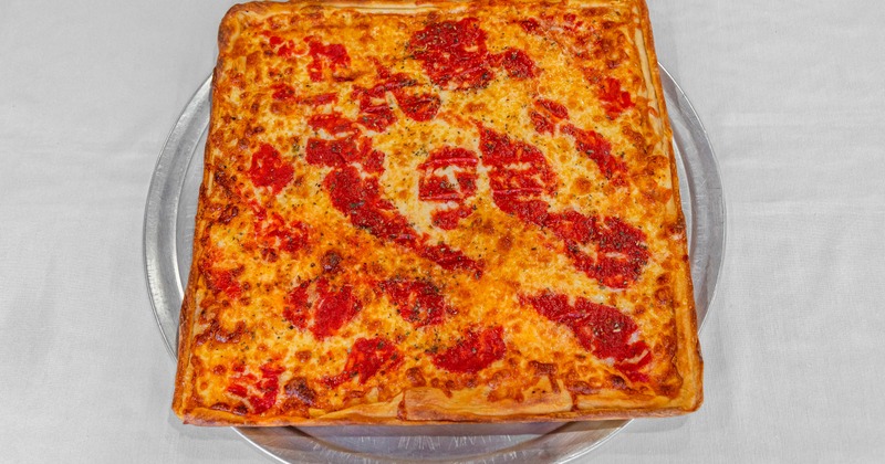 Square-cut Sicilian Pizza topped with mozzarella cheese and tomato sauce