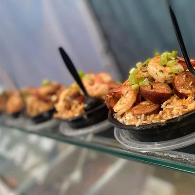 Fried rice bowls with shrimp and sausage.