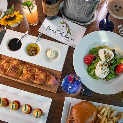 An assortment of dishes and drinks, overhead view.