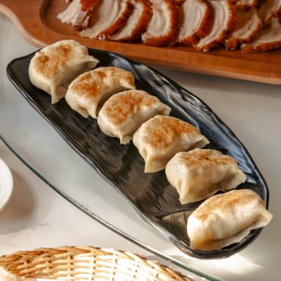 Potstickers and roast duck.