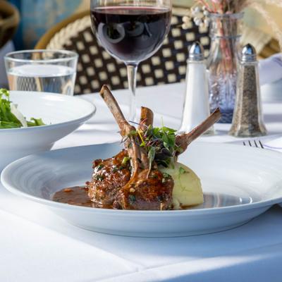 Served lamb chops in the plate.