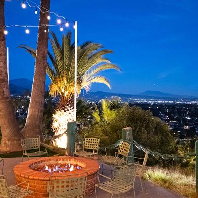 Chairs around a fire pit.