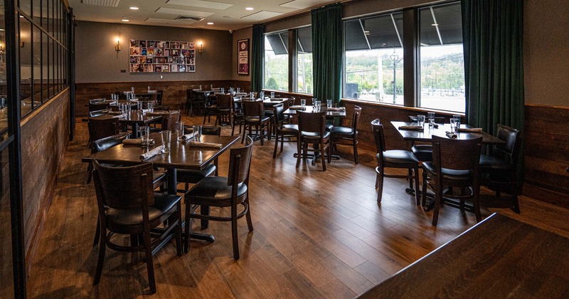 Nicely done interior dining area with set tables