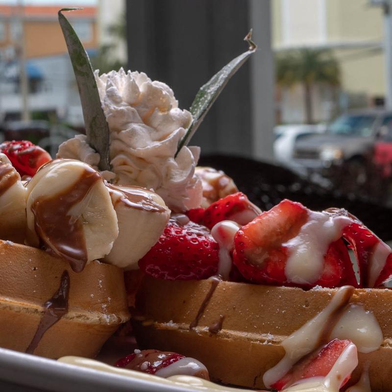 Waffle with Strawberries, Bananas, and Hazelnut Chocolate English Cream photo
