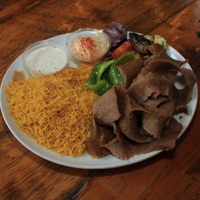 Classic Gyro  with rice, tzatziki, hummus, and mixed grilled vegetables.