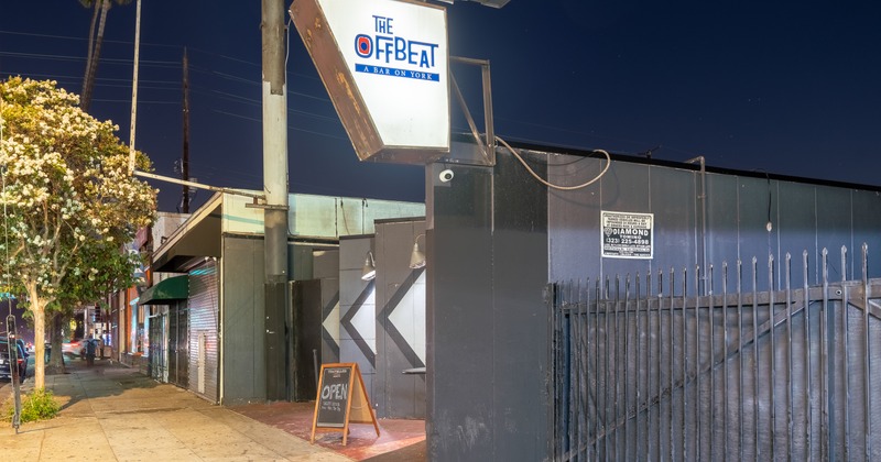 Exterior, angle view to bar entrance