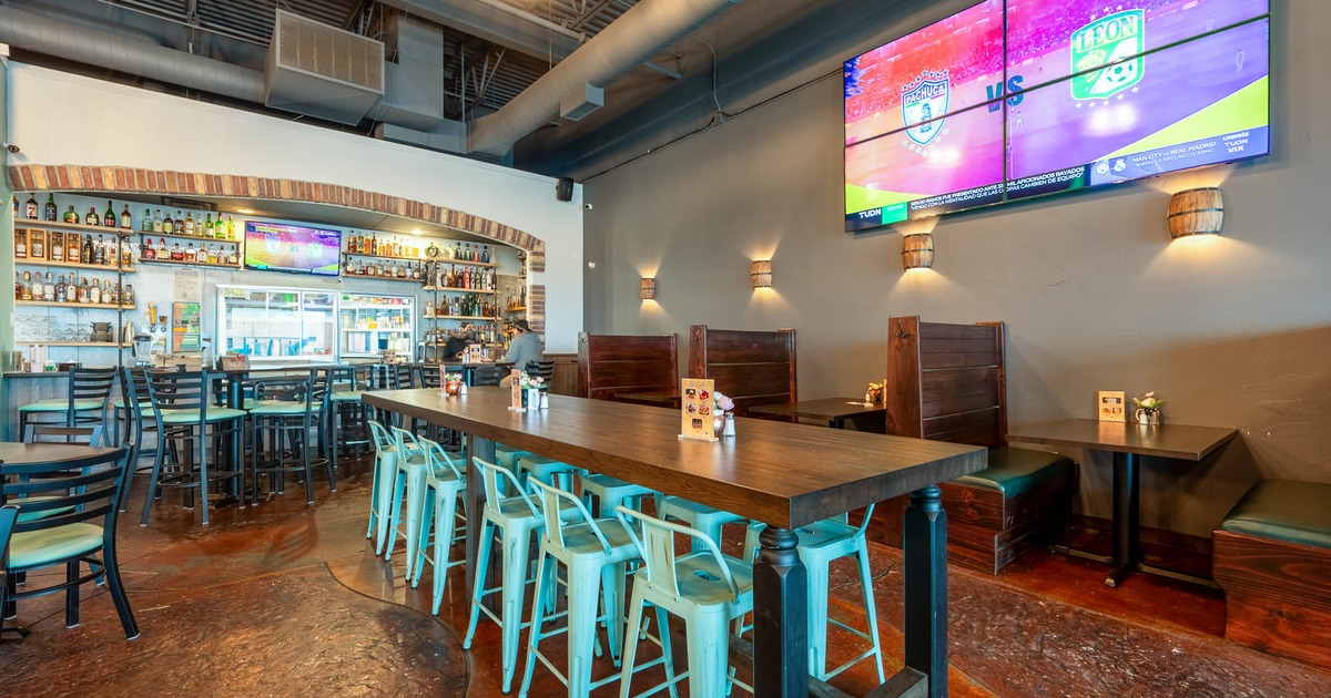 Interior, a long table with bar stools
