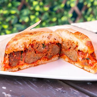 Meatball Parm sandwich cut in half.