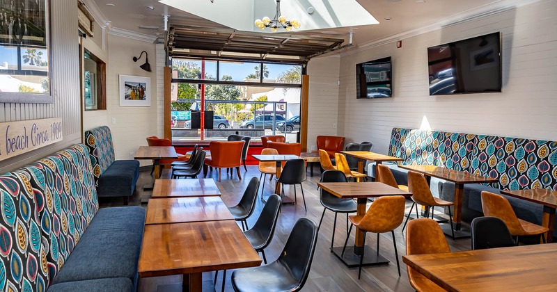 Interior, colorful benches, tables and chairs