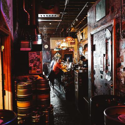 Bar area, stacked beer kegs.