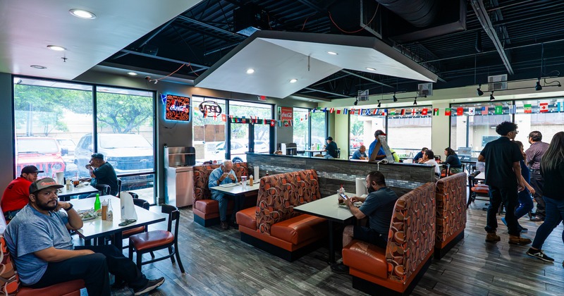 Interior, dining area with leather benches and  tables